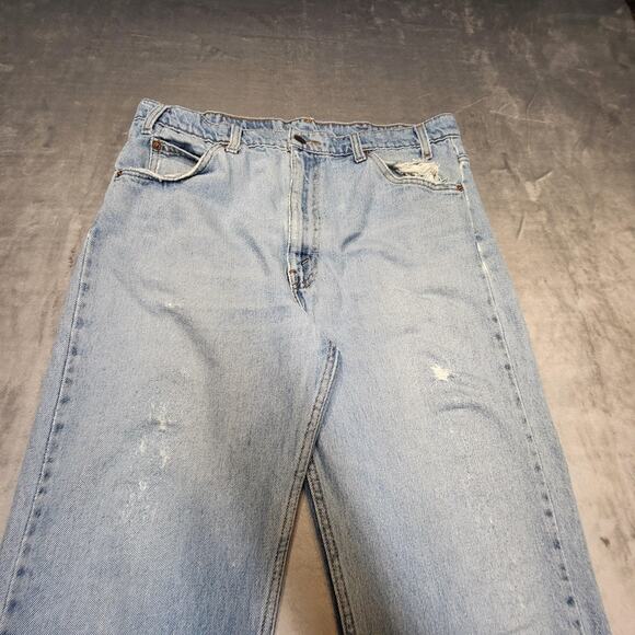 Levis 505 Jeans Mens 34x27 Blue Light Wash Straight Leg Regular Fit Distressed - Picture 2 of 14